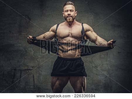 Huge Bodybuilder Rend His Garments. Studio Shoot.