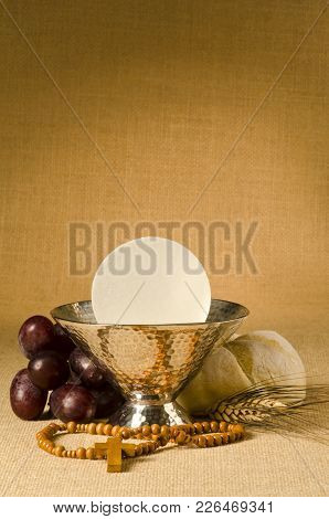First Holy Communion Composition On Beige Sackcloth Background.