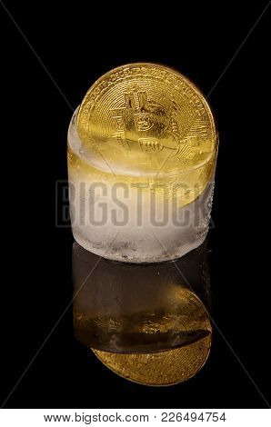 Golden Bitcoin Frozen In The Ice As A Concept Of Restrictions