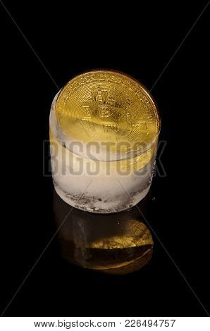 Golden Bitcoin Frozen In The Ice As A Concept Of Restrictions