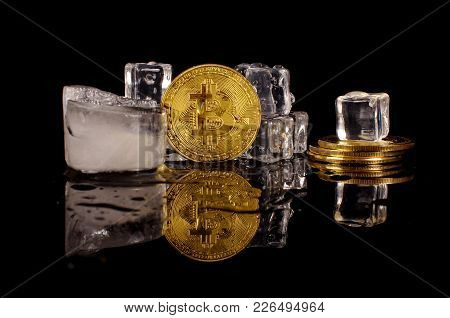 Bitcoin Coin Surrounded By Ice Cubes As A Concept Of Restrictions