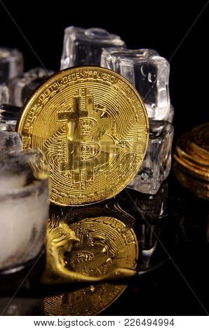 Bitcoin Coin Surrounded By Ice Cubes As A Concept Of Restrictions
