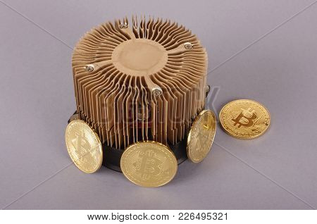 Bitcoin Mining Device And Symbolic Coins As A Profit Concept