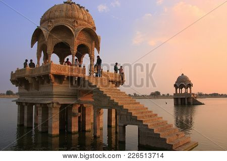 Jaisalmer, India - February 15: Unidentified People Watch Sunset At Gadi Sagar Temple On February 15