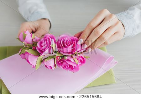 Florist Does A Wreath With Artificial Flowers From Foamiran