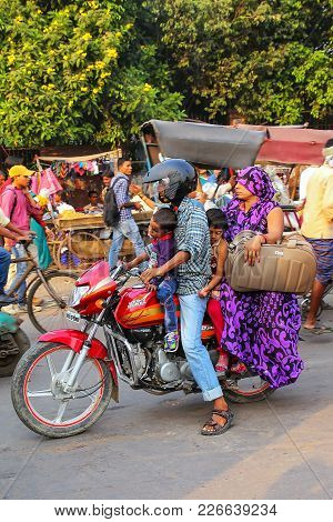 Agra, India - November 10: Unidentified People Ride Motocycle At Kinari Bazaar On November 10, 2014 
