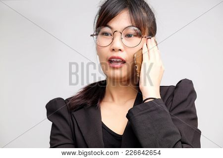 Business Women Talking With Smartphone Wear Suit And Gogles