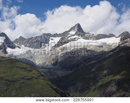 Alpine Mountains Landscapes In Swiss Alps At Switzerland, Picturesque Scenery With Lake, Seen From G