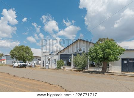 Verkeerdevlei, South Africa, February 9, 2018: A Street Scene With An Agricultural Retailer And Gas 