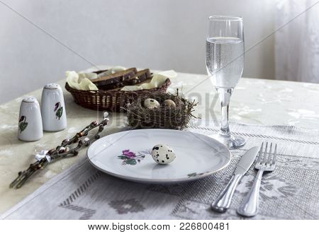 On The Table Napkin With A Plate Vegetable Stew Green Onion Glass Fork Knife And Willow Branches Sal