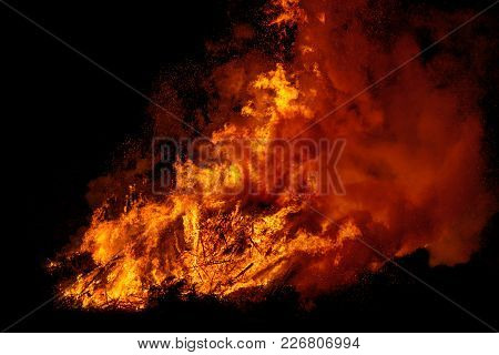 Big Bonfire With Smoke. Flames Of A Campfire In The Night.