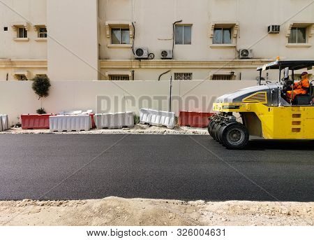 Doha, Qatar: 25 August 2019 Compactor Roller During Road Construction At Asphalting Work In Doha Qat