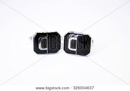 Silver Cuff Links On White Background, Close Up . Pair Of Cufflinks, Stainless Steel Cufflinks