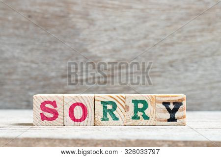 Letter Block In Word Sorry On Wood Background