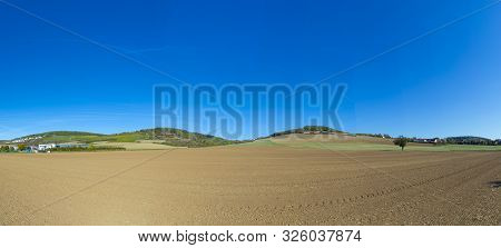 Rural Landscape With New Plowed Fields At The Romantic Street Near Rothenburg Ob Der Tauber, Germany
