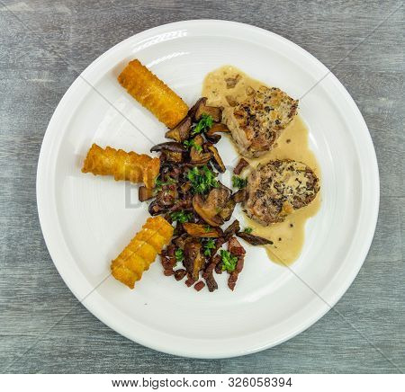 Roasted Tenderloin Cut With Fresh Mushrooms Of The Forest