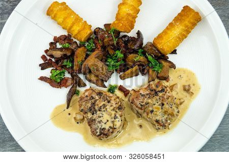 Roasted Tenderloin Cut With Fresh Mushrooms Of The Forest