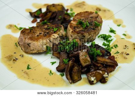 Roasted Tenderloin Cut With Fresh Mushrooms Of The Forest