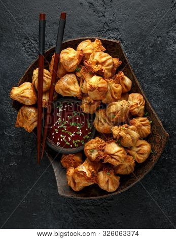 Chinese Takeaway Finger Food Vegetable Wontons With Sweet Chilli Dip Sauce And Chop Sticks