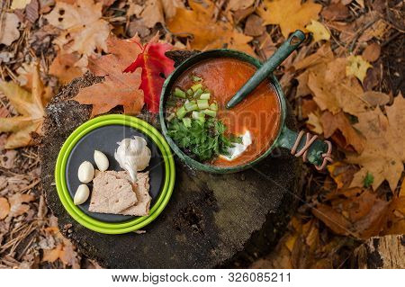 Cooking Borsch In The Forest. Cooking Borsch On The Nature. Red Soup.