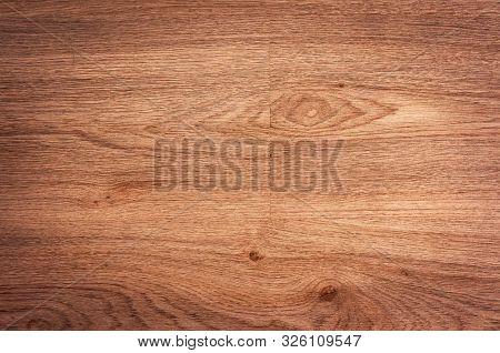 Wood background texture of board surface. Brown wooden grunge plank. Timber grain material pattern of vintage table. Wood panel of dark floor. Background for text or design