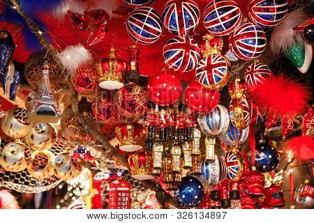 British themed glass Christmas baubles for sale at Christmas market (Christkindlmarkt) stall in Central Berlin, Germany