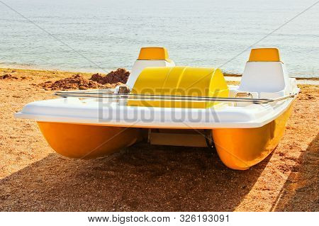 Catamaran On The Seashore. Sea Holiday. Summer