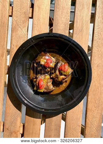 Turkish Islim Kofte / Kofta Kebab With Meatballs And Cherry Tomatoes Wrapped In Eggplant / Aubergine