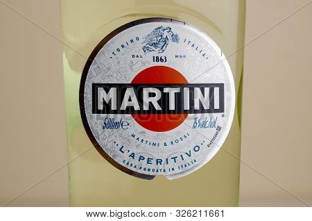 Kharkov, Ukraine - September 23, 2019: Bottle Of Vermouth Martini Rossi Close Up Logo On Beige Wall 
