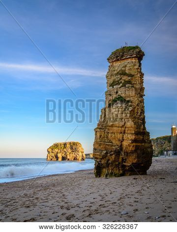 Weathered Sea Stacks At Marsden Bay, Located Near South Shields, Consisting Of A Sandy Beach Enclose