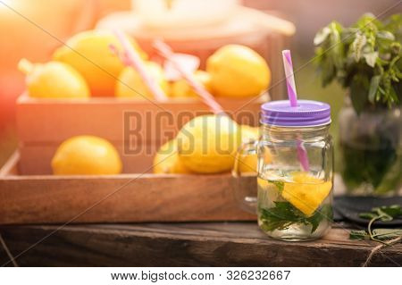 Wooden Lemonade Stand In Park. Outdoor Homemade Lemonade Stand With A Sign And  A Small Business Or 