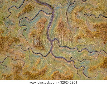 Aerial Top Down View Of Tidal Marshland With Natural Meandering Drainage System In Verdronken Land V