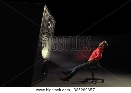 The Sound Wave Set Back An Chair With Screaming Man.