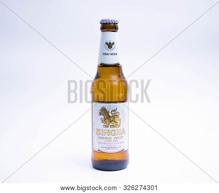 Geneva/ Switzerland - 11.06.2018 : Famous  Bottle Isolated Thai Beer Singha Premium Import Thailand