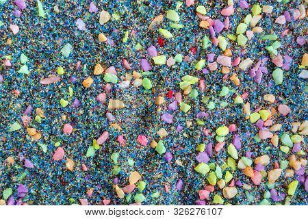 Top View With Background Of Multi-colored Small Pebbles. Multi-colored Pebbles For Garden Decoration