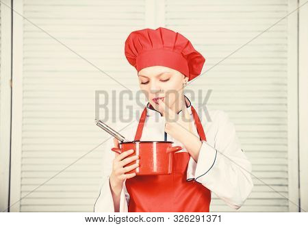 Butter Cream. Use Hand Whisk. Woman Chef Hold Whisk And Pot. Girl In Apron Whipping Eggs Or Cream. S