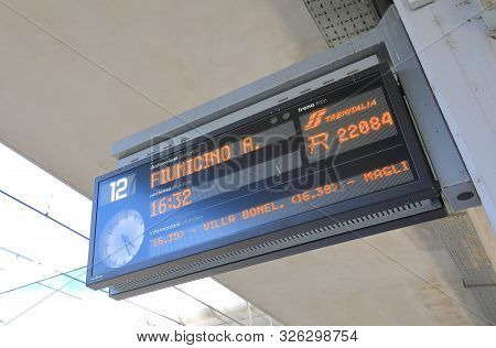 Rome Italy - June 18, 2019: Train To Rome Fiumicino Airport Arrival Display At Rome Ostiense Train S