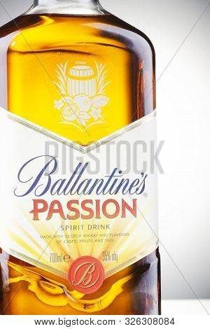 Ballantines Passion Spirit Drink On Gradient Background. Ballantines Is Blended Scotch Whisky Produc