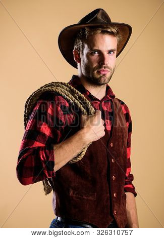 Real Man. Vintage Style Man. Wild West Retro Cowboy. Cowboy With Lasso Rope. Western. Wild West Rode