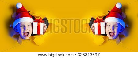 Two Little Cheerful Santas Give Gifts, Getting Out Of The Ragged Yellow Background
