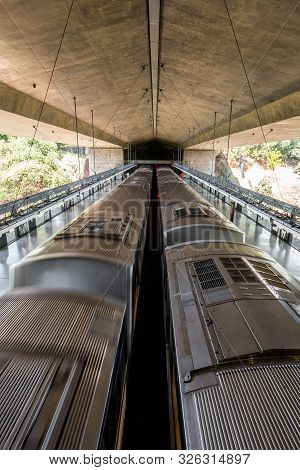 Sao Paulo, Brazil - 05, October, 2019: Vertical Picture Of Two Trains During Day Time At Sumare Metr