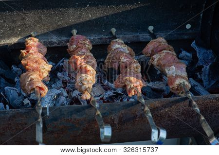 Skewers On Skewers.roasted Meat Cooked At Barbecue.bbq Fresh Beef Meat Chop Slices. Traditional East