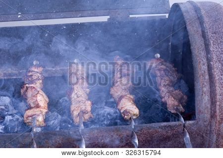 Skewers On Skewers.roasted Meat Cooked At Barbecue.bbq Fresh Beef Meat Chop Slices. Traditional East