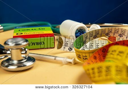 Fake Medicine Box With The Name Of The Disease Coracao And A Glucometer
