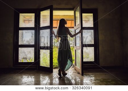 Woman Tourist In Abandoned And Mysterious Hotel In Bedugul. Indonesia, Bali Island. Bali Travel Conc