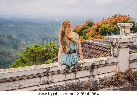 Woman Tourist In Abandoned And Mysterious Hotel In Bedugul. Indonesia, Bali Island. Bali Travel Conc