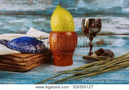 Sukkot Jewish Festival Of Traditional Religious Symbol Etrog, Lulav, Hadas, Arava Kippah Tallit Pray