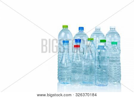 Set Of Transparent Plastic Water Bottle Isolated On White Background With Blank Label. Clear Water A
