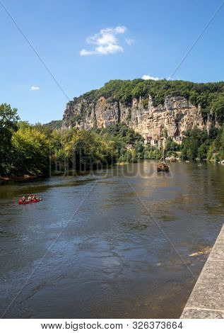 La Roque-gageac, Dordogne, France - September 7, 2018: Canoeing And Tourist Boat, In French Called G