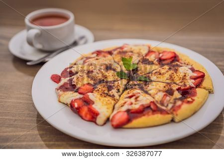 Delicious Strawberry Pizza On A Balinese Tropical Nature Background. Bali Island, Indonesia